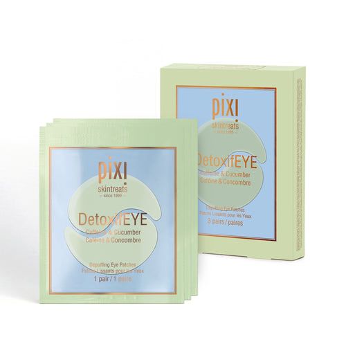 3 DetoxifEYE single use patches grouped together with a box view 1