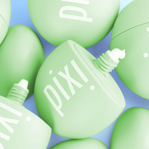 A close-up, top-down view of multiple light green Pixi HandHero arranged on a light blue background. The brand name 'pixi' is printed in white on several items. view 2