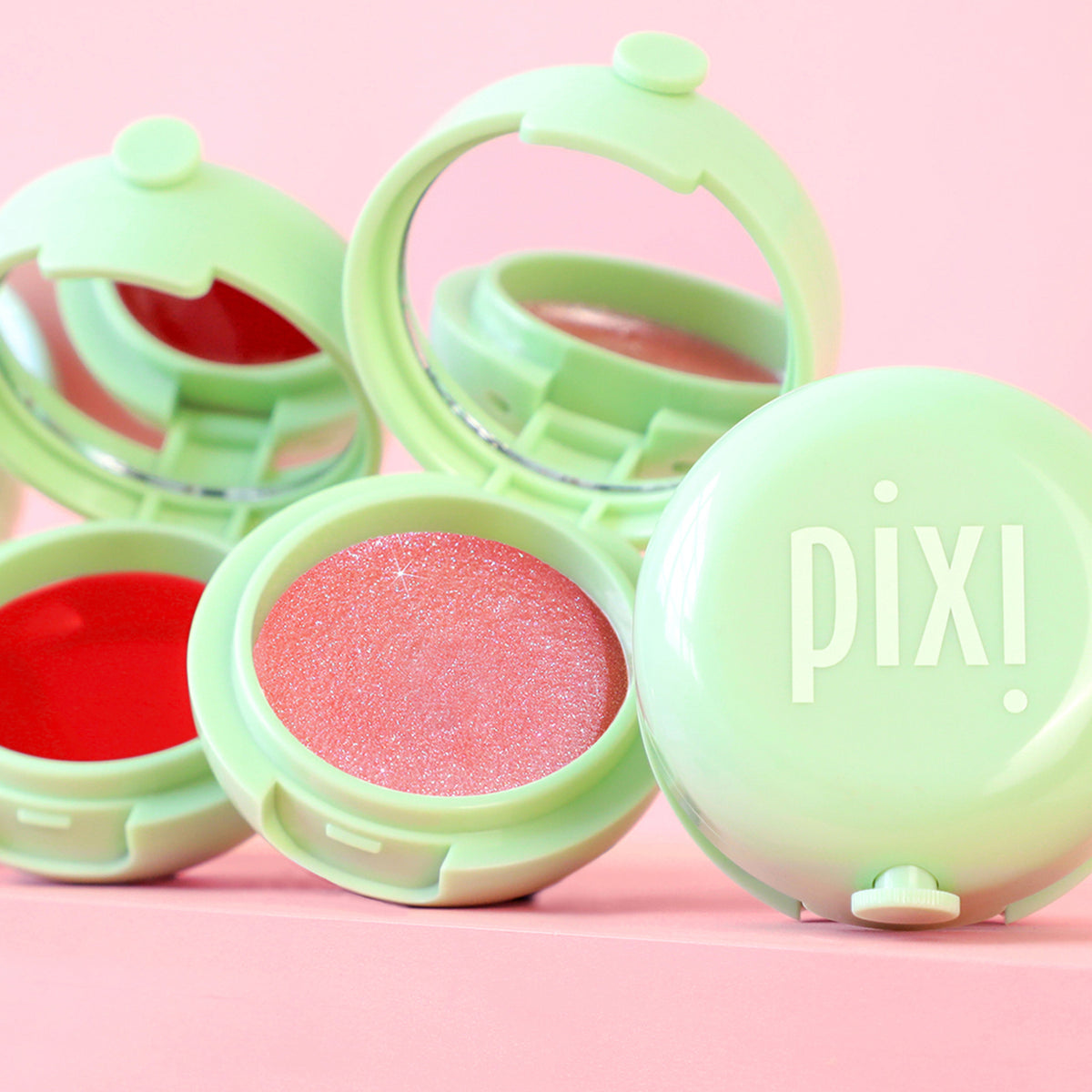 pixi beauty lipmask with open cases on a pink background