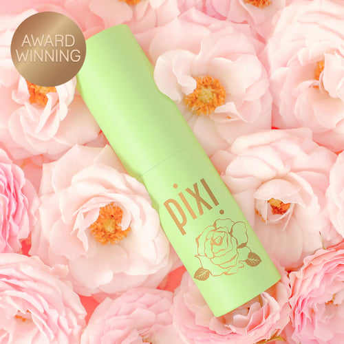 Award Winning: PixiPerfume Rose shown on a pink background with roses view 1